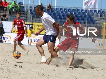 Sopot , Poland 27th June 2014 Euro Beach Soccer League tournament in Sopot.
Game between France and Switzerland.
Noel Ott (11) in action aga...