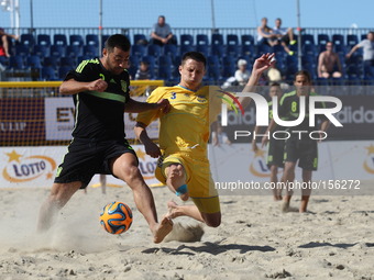 Sopot , Poland 27th June 2014 Euro Beach Soccer League tournament in Sopot.
Game between Spain and Ukraine.
Maksym Voitok (3 yellow) in acti...