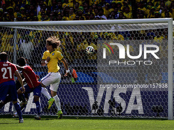 David Luiz (4) scores 1-0 for Brazil against Chile, at the match #49, for the Round of 16, of the 2014 World Cup, this saturday, June 28th,...