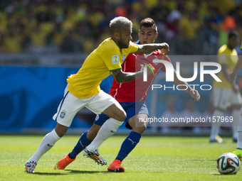 Belo Horizonte BRAZIL--28 June: Dani Alves and Vargas in the match between Brazil and Chile, correspondind at the round of last 16 of the Wo...