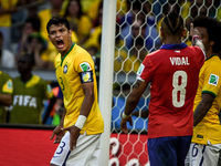 Brazil's captain, Thiago Silva (3) gives a call in his teammates after a chance of gol to Chile in the match #49, for the Round of 16, of th...