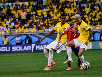 Dani Alves (2) and Luiz Gustavo (17) take the ball from Alexis Sanchez (7) atch #49, for the Round of 16, of the 2014 World Cup, between Bra...