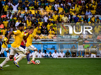 Neymar (10) is chased by Francisco Silva (5) at the match #49, for the Round of 16, of the 2014 World Cup, between Brazil and Chile, this sa...