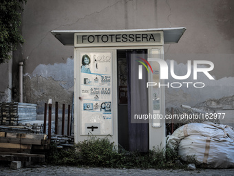 A passport photo machine in the historic center of L'Aquila, destroyed after the quake of April 6, 2009. (