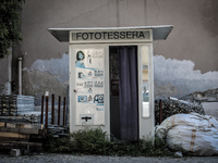 A passport photo machine in the historic center of L'Aquila, destroyed after the quake of April 6, 2009. (
