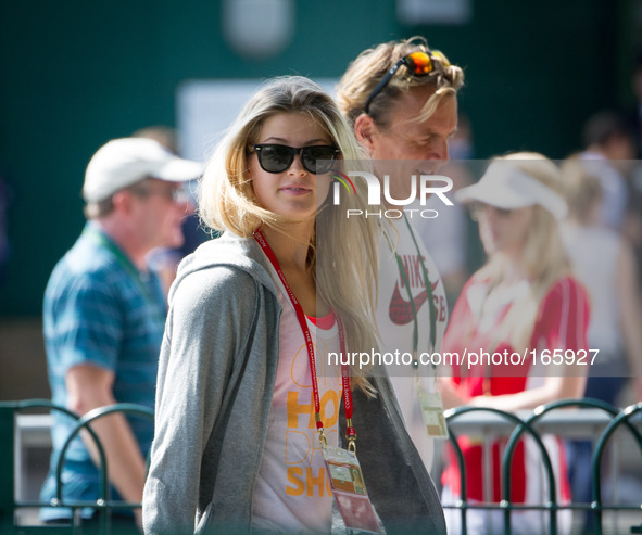 Eugenie Bouchard, in sunglasses and with loose hair seen taking a relaxing walk through Wimbledon prior to her womens final against Petra Kv...
