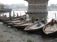 Boatmen wait for passenger on the bank of Buriganga River in Dhaka, Bangladesh on January 24, 2017.   (
