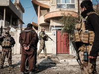 26.01.2017 Mosul, Iraq. ISIL suspects. Iraqi forces were engaged in heavy clashes  with ISIS militants in Arabi neighborhood, at least three...