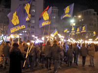 Ukrainian nationalists carry torches during march to mark the 99th anniversary of a battle near Ukrainian city Kruty, in Kiev, Ukraine, 29 J...
