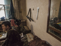 Soldier of the ukrainian army resting in the headquarters near Troitske, one of the closest village to the combat frontlines in the war in e...