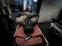 A man is treated in Gaza City after being injured during Israeli targeted airstrikes, on July 9, 2014. Countless airstrikes have hit targets...