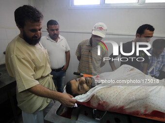 Photos from inside the Shifa Hospital for the martyrs were killed in the Shojae'ya east of Gaza City, on July 12, 2014. (