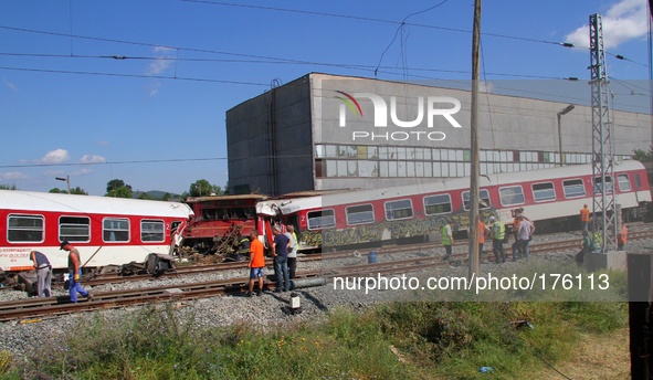 Bulgarian police officers and rescue workers attend near train crash near the village of Kalojanovec east of the Bulgarian capital Sofia, Su...