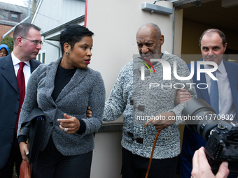 Dec. 30, 2015 File Photo: Actor and comedian Bill Cosby leaves with his legal team after a December 30, 2015 arraignment hearing at Montgome...