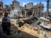 A destroyed building following an Israeli air strike in the Shati refugee camp in Gaza City. Israel has kept punishing raids on Gaza on July...