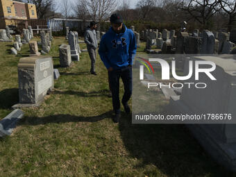 Small group of Muslims from New Jersey visit the Mt. Carmel Jewish Cemetery in Northwest Philadelphia, PA, on Feb. 27, 2017. Over the weeken...