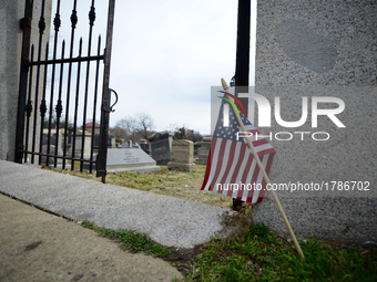 Little American flag outside the entrance to Mt. Carmel Jewish Cemetery in Northwest Philadelphia, PA, on Feb. 27, 2017. Over the weekend hu...