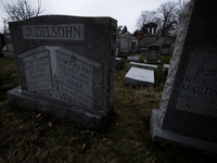 One of the vandalized headstones at Mt. Carmel Jewish Cemetery in Northwest Philadelphia, PA, bears the surname of PRESS, on Feb. 27, 2017....