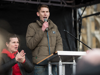 Sam Fairbairn, Secretary of People's Assembly Against Austerity, giving a speech in Parliament Square at  