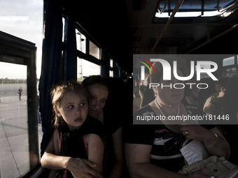 Group of Ukrainian refugees arrives in Saint Petersburg, Russia, on July 18, 2014. Russia’s emergencies situations ministry (EMERCOM) report...