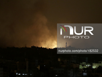 Smoke rises after an Israeli missile strikes in the east of Gaza strip along the border between Israel and Gaza City on, 20 July 2014. (