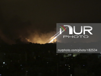 Smoke rises after an Israeli missile strikes in the east of Gaza strip along the border between Israel and Gaza City on, 20 July 2014. (