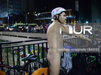 (EDITORS NOTE: Image contains nudity.)  Cyclist takes part in the 