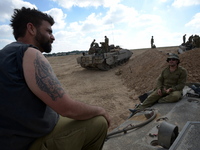 UNSPECIFIED, ISRAEL - JULY 19, 2014: Israeli reserve soldiers in an army deployment area near Israel's border with the Gaza Strip, on July 1...