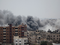 
Smoke rises after an Israeli air strike in Gaza City on 21 July 2014. israeli military operation continue on Gaza strip since 8th-July, the...