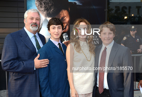 Erica Huggins and family attends the World Premiere of 