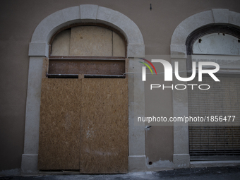 A damaged building in historic center of L'Aquila, on March 21, 2017. The Eighth anniversary of the L'Aquila earthquake will be marked on 06...