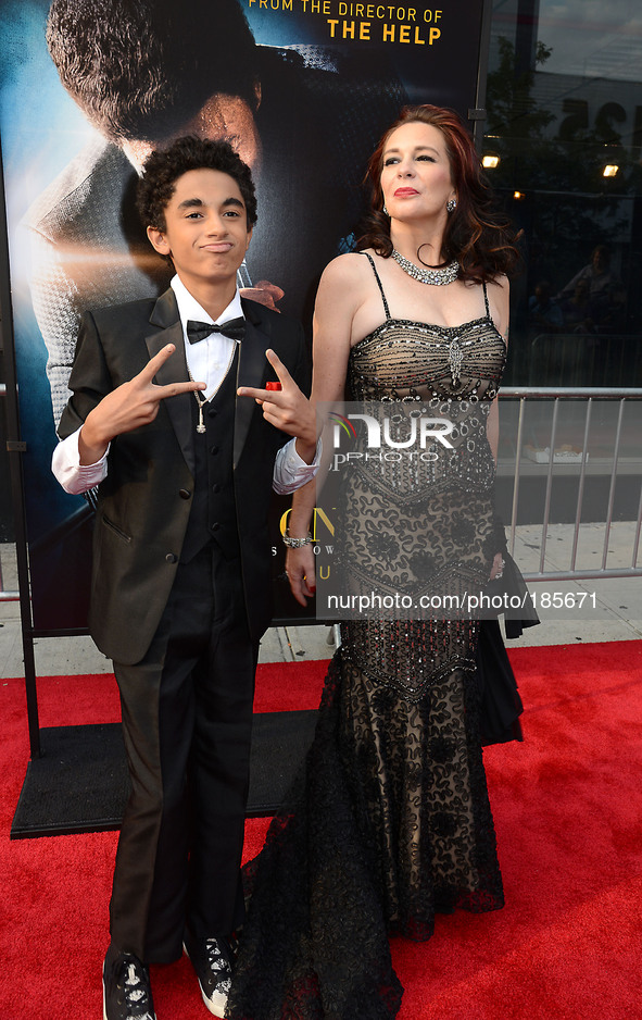 James Brown 11 and Tomi Rae Hynie Brown  attends the World Premiere of 