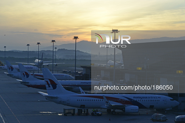 Malaysia Airlines taxied on the tarmac of Kuala Lumpur International Airport in Sepang, Malaysia, Friday, July 18, 2014. Ukraine said a pass...