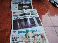 SEMARANG, INDONESIA - JULY 23: Several Indonesian newspapers carrying headlines on the victory of Indonesian Presidential Candidate Joko Wid...