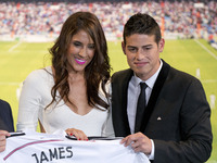 James Rodriguez and his wife Daniela Ospina during his unveiling as a new Real Madrid player at the Santaigo Bernabeu stadium on July 22, 20...