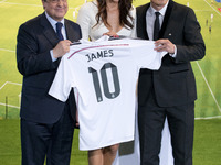James Rodriguez and his wife Daniela Ospina during his unveiling as a new Real Madrid player at the Santaigo Bernabeu stadium on July 22, 20...