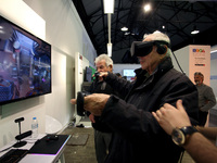 An old man is using a VR device during Athens Science Festival in Athens, Greece, March 29, 2017. Visitors have the opportunity to attend ex...