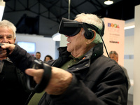 An old man is using a VR device during Athens Science Festival in Athens, Greece, March 29, 2017. Visitors have the opportunity to attend ex...