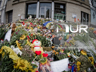 KIEV, UKRAINE - JULY 23: Piles of flowers, toys lay in front of Embassy of the Kingdom of The Netherlands in memory of MH-17 air crash victi...