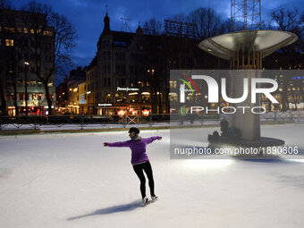 An ice skater enjoys an ice rink in central Oslo on March 03, 2017.
 (