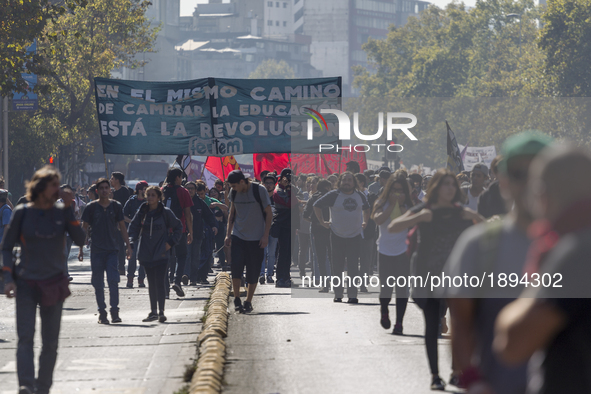 Thousands of students marched through the main avenue of Santiago, on April 11, 2017, demanding a free, quality, democratic, non-profit publ...