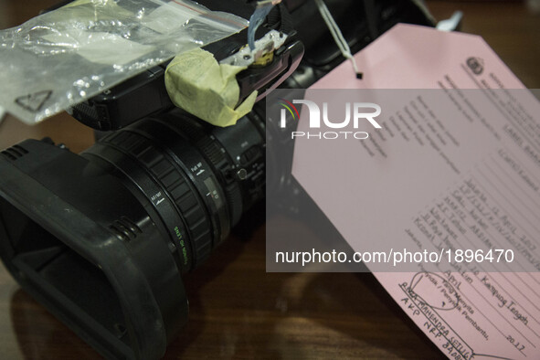 Evidence of a camera from an Indonesian Journalist displayed at South Jakarta Police HQ in Jakarta, Indonesia on 13 April 2017. Violence to...