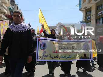Hundreds of Palestinians rally demanding the release of the Palestinian prisoners in Israeli jails during the Palestinian Prisoners Day in G...
