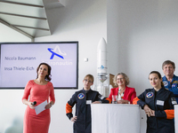 Nicola Baumann (2R)  and Insa Thiele-Eich (2L) answer the questions of the media after having been nominated as the next German female astro...