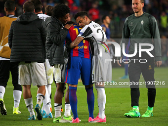 Neymar Jr. crying, comforted by Dani Alves and Juan Cuadrado at the end of the UEFA Champions League match between F.C. Barcelona v Juventus...