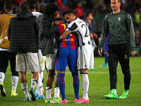 Neymar Jr. crying, comforted by Dani Alves and Juan Cuadrado at the end of the UEFA Champions League match between F.C. Barcelona v Juventus...