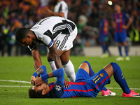 Neymar Jr. crying, comforted by Mario Lemina at the end of the UEFA Champions League match between F.C. Barcelona v Juventus, in Barcelona,...