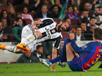 Giorgio Chiellini and Gerard Pique during UEFA Champions League match between F.C. Barcelona v PSG, in Barcelona, on march 08, 2017.  (