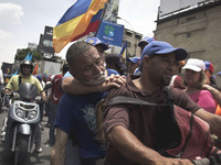 An injured person during clashes with police during a march against Venezuelan President Nicolas Maduro, in Caracas on April 19, 2017. Venez...