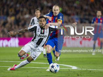Dani Alves of Juventus FC and Andres Iniesta of FC Barcelona during the UEFA Champions League Quarter Final second leg match between FC Barc...